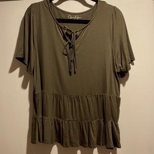 Army green tee shirt with fun, feminine details.